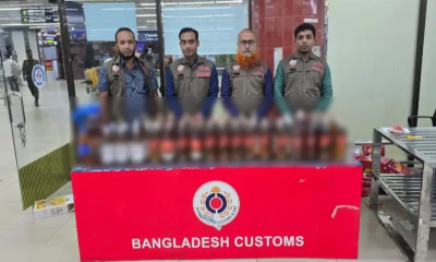 শাহজালাল বিমানবন্দরে ৭৭ বোতল বিদেশি মদসহ রুশ নাগরিক আটক
